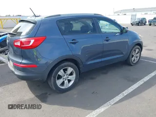 2012 Kia Sportage LX with VIN KNDPB3A2XC7287773, listed as a IAAI auction lot 42139714 with 192,880 mi miles. Bid and sale history available at carsss.com. Image 4.