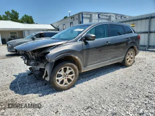 2015 Mazda CX-9 Sport с VIN JM3TB2BA5F0459548, выставлен на аукционе Copart как лот 60217845 с пробегом 152 486 миль миль и Чистый • Clean title. История ставок и продаж доступна на DreamBid. Изображение 1.