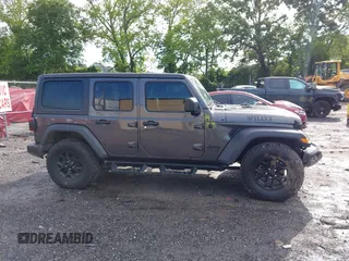 2021 Jeep Wrangler Unlimited Willys с VIN 1C4HJXDG2MW646904, выставлен на аукционе IAAI как лот 42267506 с пробегом 55 530 миль миль и . История ставок и продаж доступна на DreamBid. Изображение 14.