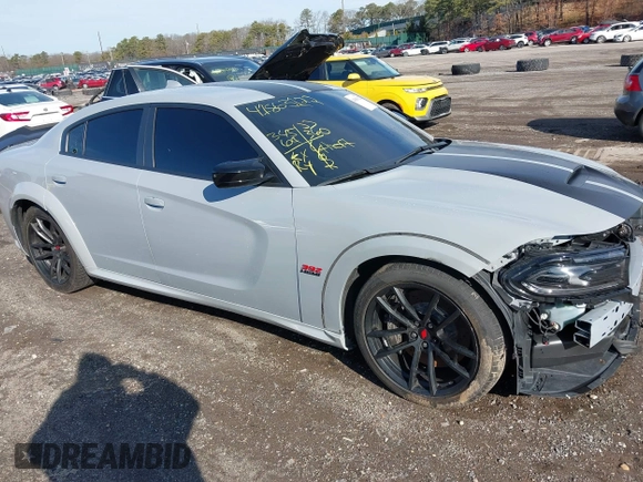 2022 Dodge Charger Scat Pack Widebody with VIN 2C3CDXGJ6NH176650, listed as a IAAI auction lot 41863122 with 34,569 mi miles and . Bid and sale history available at DreamBid. Image 13.