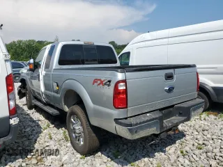 2014 Ford F-250 XL with VIN 1FT7X2B67EEA13796, listed as a Copart auction lot 61712565 with 130,090 mi miles and Salvage title. Bid and sale history available at DreamBid. Image 2.