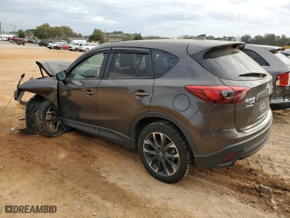 2016 Mazda CX-5 Grand Touring with VIN JM3KE4DYXG0885407, listed as a Copart auction lot 79315894 with NaN miles and Salvage Title. Bid and sale history available at carsss.com. Image 2.