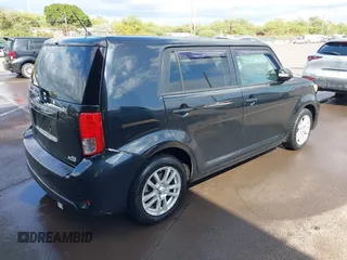 2014 Scion xB with VIN JTLZE4FE4EJ064549, listed as a IAAI auction lot 41392280 with 148,962 mi miles. Bid and sale history available at carsss.com. Image 4.