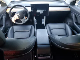 2019 Tesla Model 3 Mid Range z VIN 5YJ3E1EA2KF476194, wystawiony jako Copart lot #51140115 z przebiegiem Nie podano mil oraz Szkoda całkowita • Salvage title. Historia ofert i sprzedaży dostępna na DreamBid. Obrazek 8.