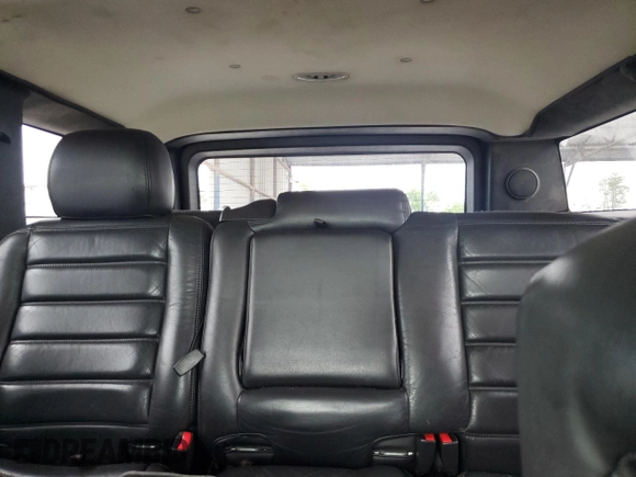 2006 Hummer H2 z VIN 5GRGN23U66H116855, wystawiony jako Copart lot #56010175 z przebiegiem 217 798 mil mil oraz Tytuł czysty. Historia ofert i sprzedaży dostępna na DreamBid. Obrazek 10.