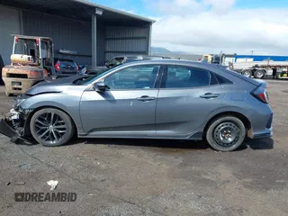 2021 Honda Civic Sport with VIN SHHFK7H40MU222581, listed as a IAAI auction lot 41451121 with 28,372 mi miles and . Bid and sale history available at DreamBid. Image 14.