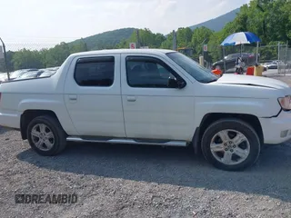 2010 Honda Ridgeline RTL with VIN 5FPYK1F58AB012526, listed as a IAAI auction lot 42421618 with 258,727 mi miles and . Bid and sale history available at DreamBid. Image 13.