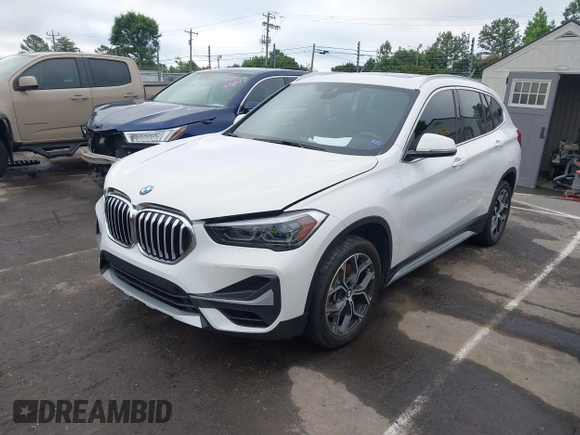 2021 BMW X1 xDrive28i with VIN WBXJG9C01M5S06181, listed as a IAAI auction lot 42292167 with 55,966 mi miles and . Bid and sale history available at DreamBid. Image 17.