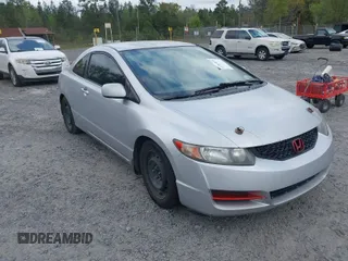2010 Honda Civic Cpe LX with VIN 2HGFG1B60AH523854, listed as a IAAI auction lot 41953070 with 308,179 mi miles. Bid and sale history available at carsss.com. Image 1.