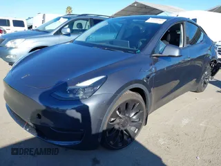 2022 Tesla Model Y Performance with VIN 7SAYGDEF7NF562895, listed as a IAAI auction lot 41692864 with 29,904 mi miles and . Bid and sale history available at DreamBid. Image 16.