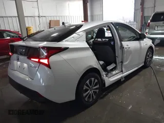 2021 Toyota Prius LE with VIN JTDL9MFU9M3025214, listed as a IAAI auction lot 41375860 with 76,259 mi miles and . Bid and sale history available at DreamBid. Image 4.
