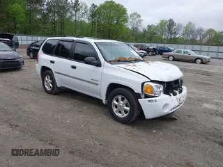 2006 GMC Envoy SLE z VIN 1GKDS13S862109127, wystawiony jako IAAI lot #41983835 z przebiegiem 128 538 mil mil oraz . Historia ofert i sprzedaży dostępna na DreamBid. Obrazek 1.
