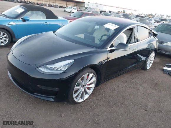 2019 Tesla Model 3 Long Range with VIN 5YJ3E1EBXKF393329, listed as a IAAI auction lot 41586996 with 70,269 mi miles. Bid and sale history available at carsss.com. Image 20.