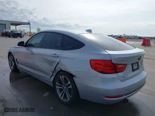 2014 BMW 3 Series Gran Turismo 328i xDrive with VIN WBA3X5C56ED242950, listed as a IAAI auction lot 41876120 with 186,315 mi miles. Bid and sale history available at carsss.com. Image 3.