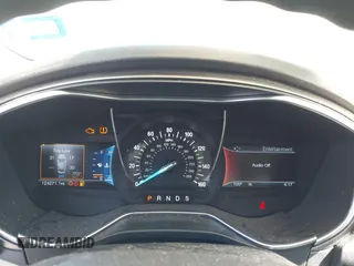 2017 Ford Fusion SE z VIN 3FA6P0HD6HR163041, wystawiony jako IAAI lot #42018701 z przebiegiem 124 271 mil mil oraz . Historia ofert i sprzedaży dostępna na DreamBid. Obrazek 7.
