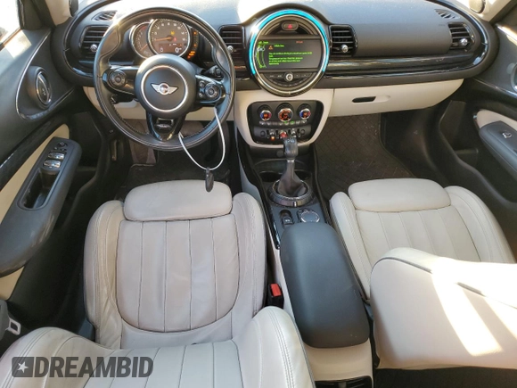 2017 MINI Clubman Cooper S with VIN WMWLU5C56H2E82110, listed as a Copart auction lot 79826004 with 82,756 mi miles and Clean Title. Bid and sale history available at carsss.com. Image 8.