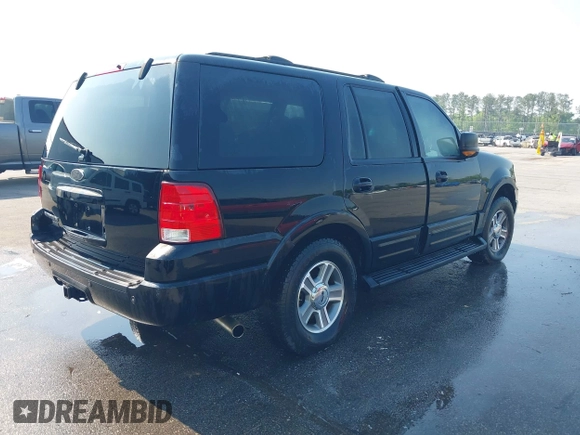 2004 Ford Expedition Eddie Bauer with VIN 1FMPU17L54LA74068, listed as a IAAI auction lot 41974666 with 292,308 mi miles. Bid and sale history available at carsss.com. Image 4.