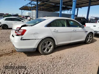 2015 Ford Taurus SEL with VIN 1FAHP2E92FG172960, listed as a Copart auction lot 79465914 with 115,115 mi miles and Salvage Title. Bid and sale history available at DreamBid. Image 3.