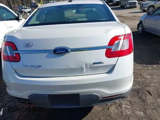 2010 Ford Taurus SEL with VIN 1FAHP2EW1AG148874, listed as a IAAI auction lot 41129750 with 205,578 mi miles and . Bid and sale history available at carsss.com. Image 16.