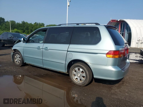 2003 Honda Odyssey EX-L с VIN 2HKRL18033H501741, выставлен на аукционе Copart как лот 60496865 с пробегом Не указан миль и Списание • Salvage title. История ставок и продаж доступна на DreamBid. Изображение 2.