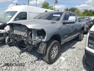 2024 Ram 2500 Laramie z VIN 3C6UR5FLXRG104906, wystawiony jako Copart lot #55327515 z przebiegiem 23 990 mil mil oraz Szkoda całkowita • Salvage title. Historia ofert i sprzedaży dostępna na DreamBid. Obrazek 1.