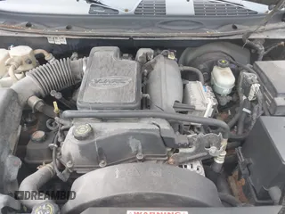 2002 GMC Envoy SLT with VIN 1GKDT13S222143135, listed as a IAAI auction lot 42136672 with 206,064 mi miles. Bid and sale history available at carsss.com. Image 10.