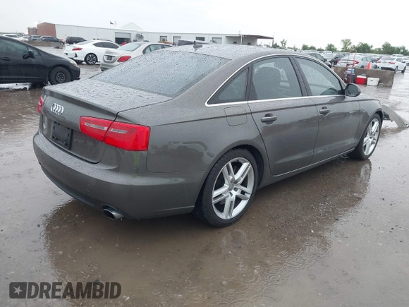 2014 Audi A6 Premium Plus z VIN WAUGFAFC3EN087176, wystawiony jako IAAI lot #42117602 z przebiegiem 53 571 mil mil oraz . Historia ofert i sprzedaży dostępna na DreamBid. Obrazek 4.