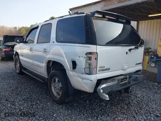 2003 Chevrolet Tahoe LS with VIN 1GNEC13Z83J321559, listed as a IAAI auction lot 41461500 with 180,756 mi miles. Bid and sale history available at carsss.com. Image 3.