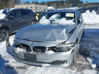 2015 BMW 3 Series 328i xDrive with VIN WBA3B5G5XFNS20065, listed as a IAAI auction lot 41590092 with 119,242 mi miles. Bid and sale history available at carsss.com. Image 12.
