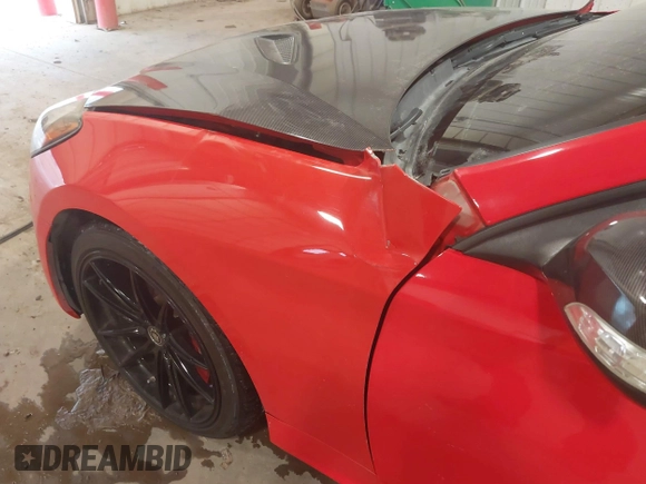 2013 Hyundai Genesis Coupe R-Spec with VIN KMHHU6KJ4DU101925, listed as a IAAI auction lot 41190063 with 86,077 mi miles and . Bid and sale history available at DreamBid. Image 6.