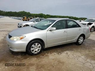 2002 Toyota Camry LE z VIN 4T1BE32K62U058079, wystawiony jako Copart lot #57960965 z przebiegiem 211 182 mil mil oraz Szkoda całkowita • Salvage title. Historia ofert i sprzedaży dostępna na DreamBid. Obrazek 1.