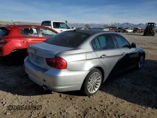 2010 BMW 3 Series 335i xDrive with VIN WBAPL3C57AA407952, listed as a Copart auction lot 85510004 with 128,631 mi miles and Salvage title. Bid and sale history available at DreamBid. Image 3.
