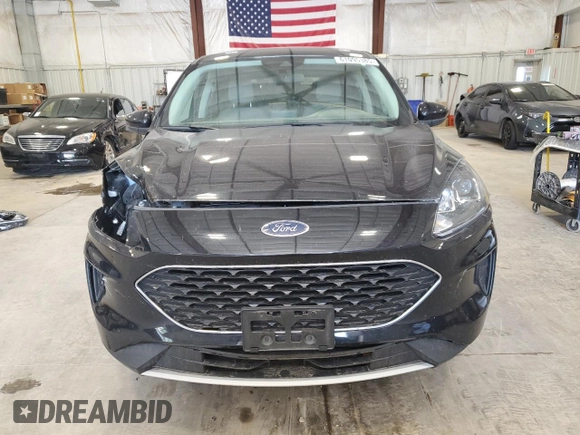 2021 Ford Escape SE with VIN 1FMCU9G69MUB23483, listed as a Copart auction lot 61095385 with 54,562 mi miles and Salvage title. Bid and sale history available at DreamBid. Image 5.