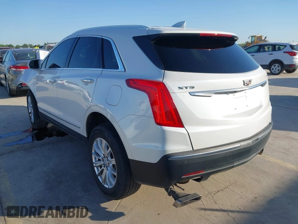 2018 Cadillac XT5 Luxury FWD z VIN 1GYKNCRS3JZ143354, wystawiony jako IAAI lot #41973536 z przebiegiem 101 327 mil mil oraz . Historia ofert i sprzedaży dostępna na DreamBid. Obrazek 3.