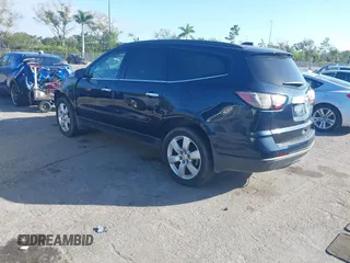 2016 Chevrolet Traverse LT with VIN 1GNKRGKD4GJ307061, listed as a IAAI auction lot 40880472 with 200,802 mi miles. Bid and sale history available at carsss.com. Image 3.