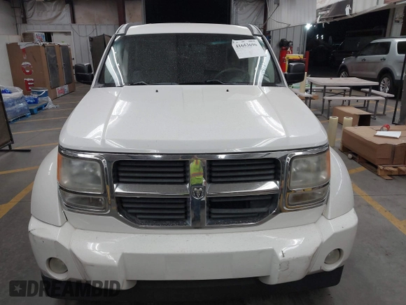 2007 Dodge Nitro SLT with VIN 1D8GU58K97W583408, listed as a IAAI auction lot 41653696 with 124,449 mi miles. Bid and sale history available at carsss.com. Image 12.