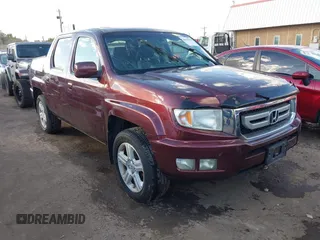 2009 Honda Ridgeline RTL with VIN 5FPYK16549B103496, listed as a IAAI auction lot 40645940 with 168,132 mi miles. Bid and sale history available at carsss.com. Image 1.
