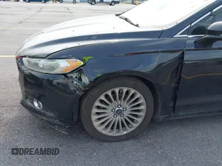2016 Ford Fusion Titanium with VIN 3FA6P0K90GR179528, listed as a IAAI auction lot 42181213 with 230,264 mi miles. Bid and sale history available at carsss.com. Image 17.