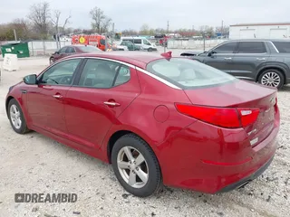 2015 Kia Optima LX with VIN 5XXGM4A72FG357449, listed as a IAAI auction lot 42079075 with 136,042 mi miles. Bid and sale history available at carsss.com. Image 3.