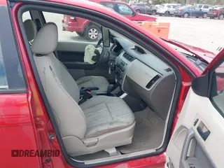 2011 Ford Focus SE with VIN 1FAHP3FN6BW133127, listed as a IAAI auction lot 42009740 with 75,088 mi miles and . Bid and sale history available at DreamBid. Image 5.