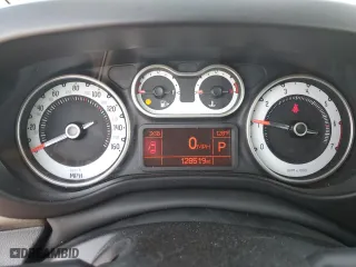 2014 FIAT 500L Trekking with VIN ZFBCFADH4EZ010196, listed as a Copart auction lot 62566094 with 128,519 mi miles and Salvage Title. Bid and sale history available at carsss.com. Image 9.