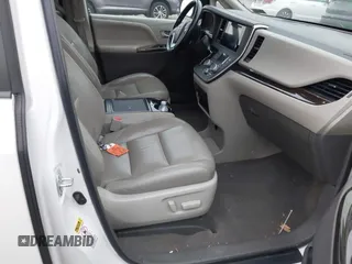 2015 Toyota Sienna XLE with VIN 5TDYK3DC9FS595827, listed as a IAAI auction lot 41014820 with 119,143 mi miles. Bid and sale history available at carsss.com. Image 5.