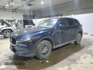 2020 Mazda CX-5 Touring z VIN JM3KFBCM2L1817414, wystawiony jako Copart lot #89406875 z przebiegiem Nie podano mil oraz Szkody całkowita. Historia ofert i sprzedaży dostępna na DreamBid. Obrazek 1.