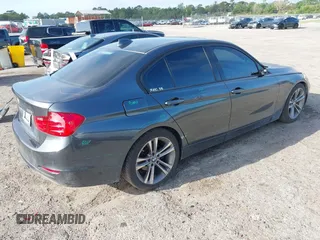 2014 BMW 3 Series 328i with VIN WBA3C1C52EK116956, listed as a IAAI auction lot 41907691 with 125,856 mi miles. Bid and sale history available at carsss.com. Image 4.