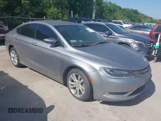 2015 Chrysler 200 Limited with VIN 1C3CCCAB1FN656181, listed as a IAAI auction lot 42011014 with 293,897 mi miles. Bid and sale history available at carsss.com. Image 1.