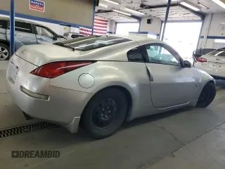2003 Nissan 350Z Touring с VIN JN1AZ34D03T114076, выставлен на аукционе Copart как лот 61078255 с пробегом 187 952 миль миль и Списание • Salvage title. История ставок и продаж доступна на DreamBid. Изображение 3.