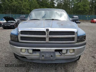 2000 Dodge 2500 z VIN 3B7KC2360YG146577, wystawiony jako Copart lot #57868995 z przebiegiem 360 637 mil mil oraz Tytuł czysty. Historia ofert i sprzedaży dostępna na DreamBid. Obrazek 5.