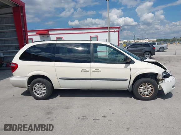 2003 Dodge Grand Caravan with VIN 2D4GP443X3R171373, listed as a IAAI auction lot 41645178 with 163,358 mi miles and . Bid and sale history available at DreamBid. Image 13.