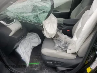 2024 Toyota RAV4 Hybrid XLE Premium z VIN 4T3B6RFVXRU173774, wystawiony jako Copart lot #57258085 z przebiegiem Nie podano mil oraz Szkoda całkowita • Salvage title. Historia ofert i sprzedaży dostępna na DreamBid. Obrazek 7.