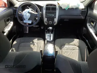 2009 Kia Spectra SX z VIN KNAFE221095025989, wystawiony jako Copart lot #57583155 z przebiegiem 261 776 mil mil oraz Szkoda całkowita • Salvage title. Historia ofert i sprzedaży dostępna na DreamBid. Obrazek 8.